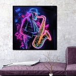 Glasbild mit LED-Beleuchtung – Saxofonist rosa LED 80x80 cm